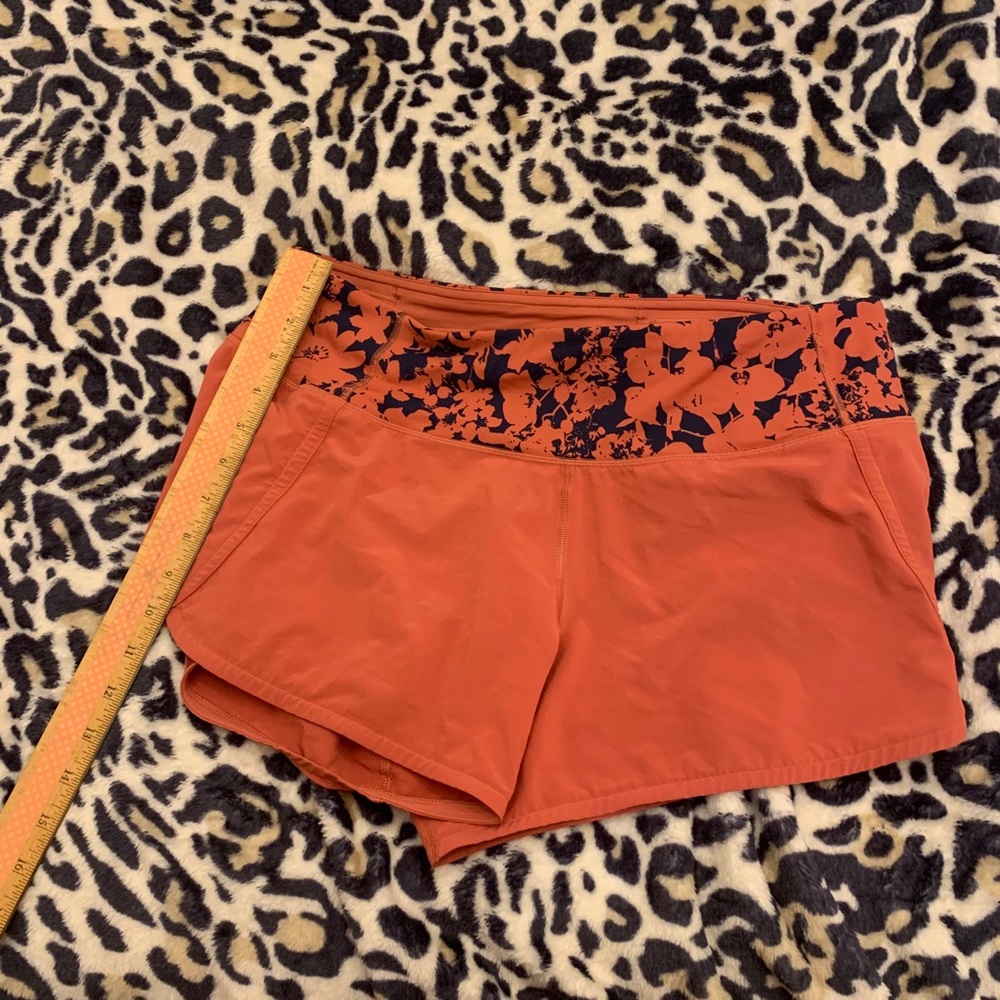 Orange lulu lemon shirts with floral waistband